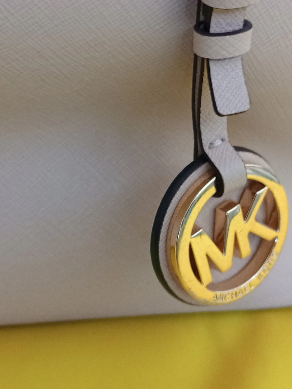 Michael Kors Cream Leather Tote with Gold Logo Charm